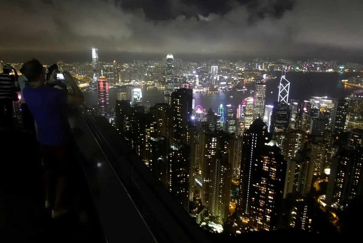 People take photos of Hong Kong from the Peak Tower, China on Sept. 5, 2019. (Amr Abdallah Dalsh/Reuters)