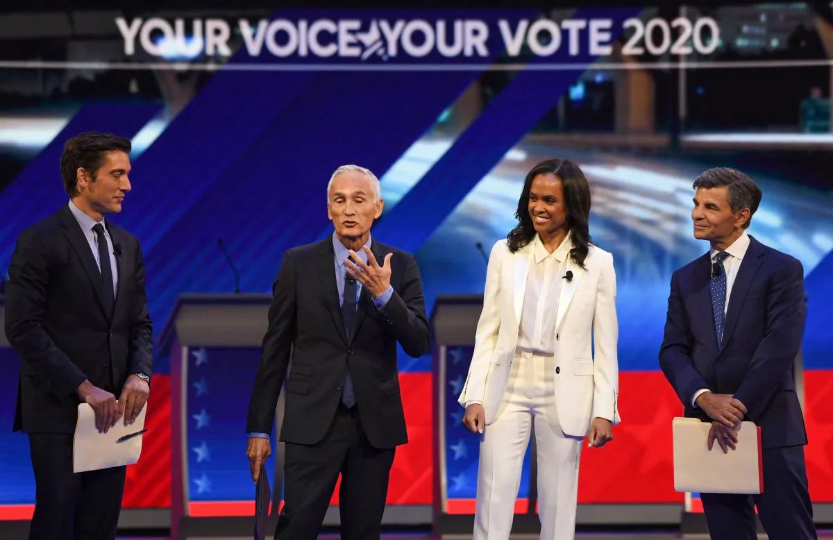 Moderators (L-R) ABC journalist David Muir, US-Mexican journalist Jorge Ramos, Newscaster Linsey Davis, and former Clinton administration official and current ABC News anchor George Stephanopoulos arrive on stage for the third Democratic primary debate of the 2020 presidential campaign season in Houston, Texas on Sept. 12, 2019. (Robyn Beck/AFP/Getty Images)