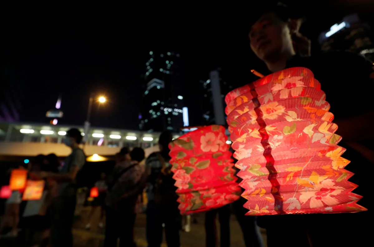 People hold traditional lanterns as they gather to form a human chain during the Mid-Autumn Festival at Lennon Wall at Admiralty district in Hong Kong, China on Sept. 13, 2019. (Amr Abdallah Dalsh/Reuters)