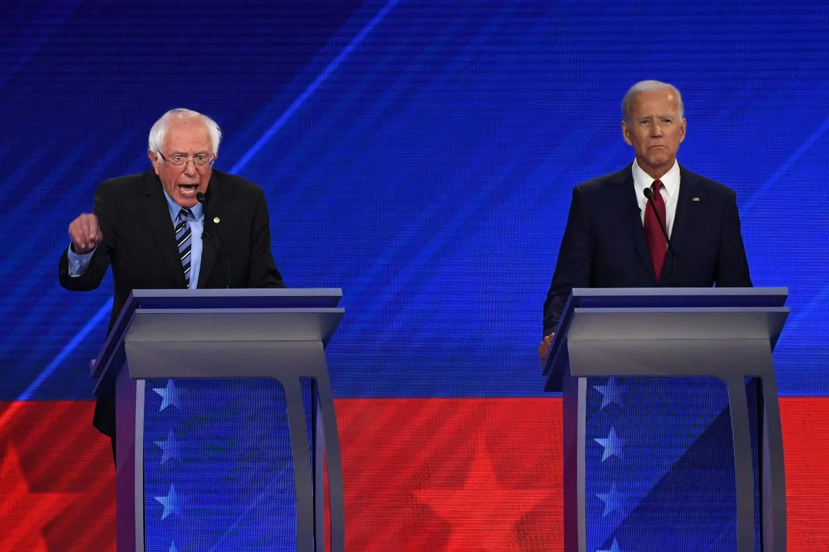 Democratic presidential hopefuls Sen. Bernie Sanders (I-Vt.), left, and former vice president Joe Biden during the third Democratic primary debate in Houston, Texas on Sept. 12, 2019. (Robyn Beck/AFP/Getty Images)