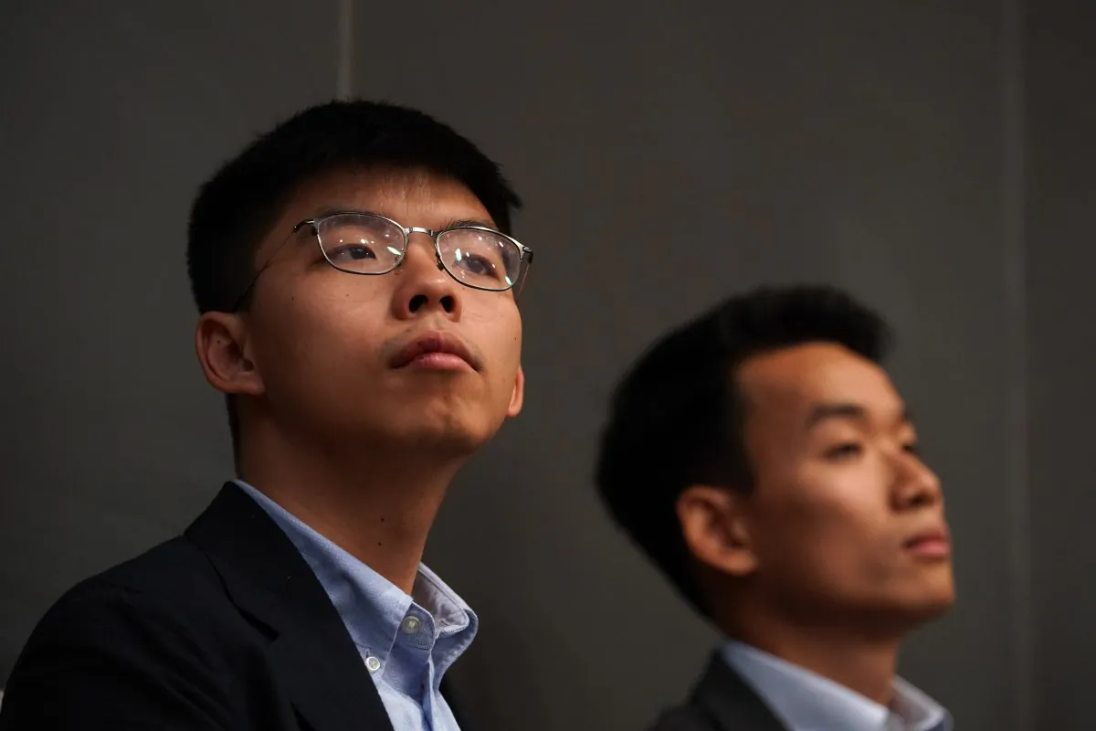 Joshua Wong (L), Hong Kong student activist and politician and Brian Leung Kai-ping, graduate student of the University of Washington,attends a panel discussion in a Weatherhead East Asian Institute Event on Anti-Extradition Law Movement in Hong Kong at Columbia Law School in New York, N.Y., on Sept. 13, 2019. (Timothy A. Clary/AFP/Getty Images)
