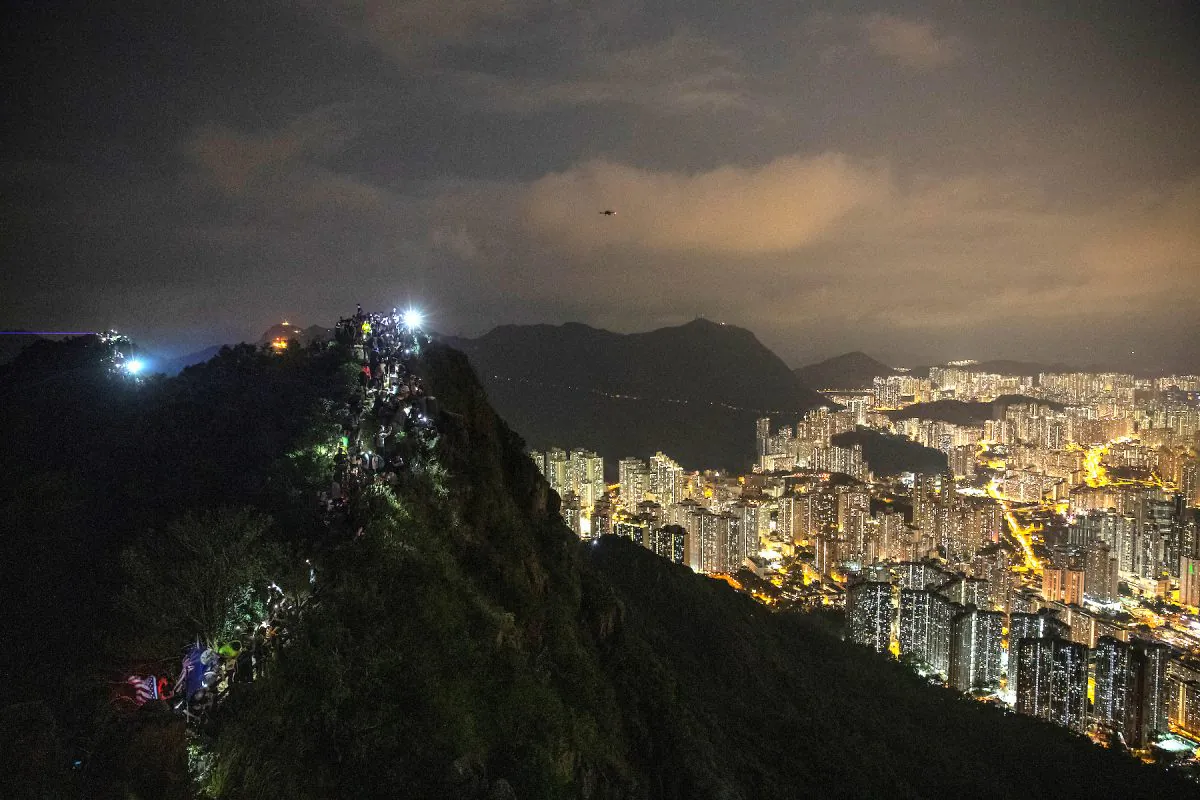 Anti-government protesters gather at Lion Rock, in Hong Kong on Sept. 13, 2019. (Reuters/Athit Perawongmetha)