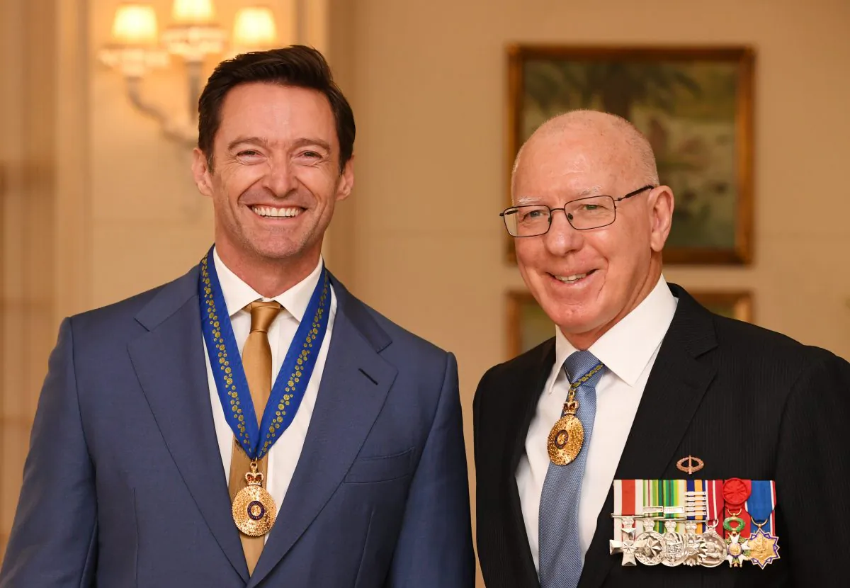 Australian actor Hugh Jackman is awarded an Order of Australia by The Governor-General of Australia David Hurley at Government House in Melbourne, Australia on Sept. 13, 2019. (Tracey Nearmy/Getty Images)