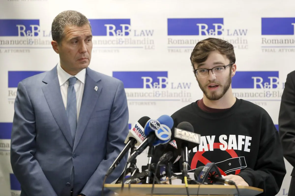 Adam Hergenreder (R) responds to a question as attorney Antonio Romanucci listens during a news conference in Chicago on Sept. 13, 2019. (Charles Rex Arbogast/AP Photo)