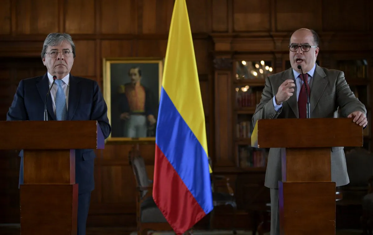 Carlos Holmes Trujillo (L), Colombia’s foreign affairs minister, and Julio Borges, commissioner for foreign affairs appointed by Venezuela’s head of congress Juan Guaido—who has declared himself Venezuelan president with support from 50 countries—hold a joint press conference in Bogota, Colombia, on Aug. 30, 2019. (Raul Arboleda/AFP/Getty Images)