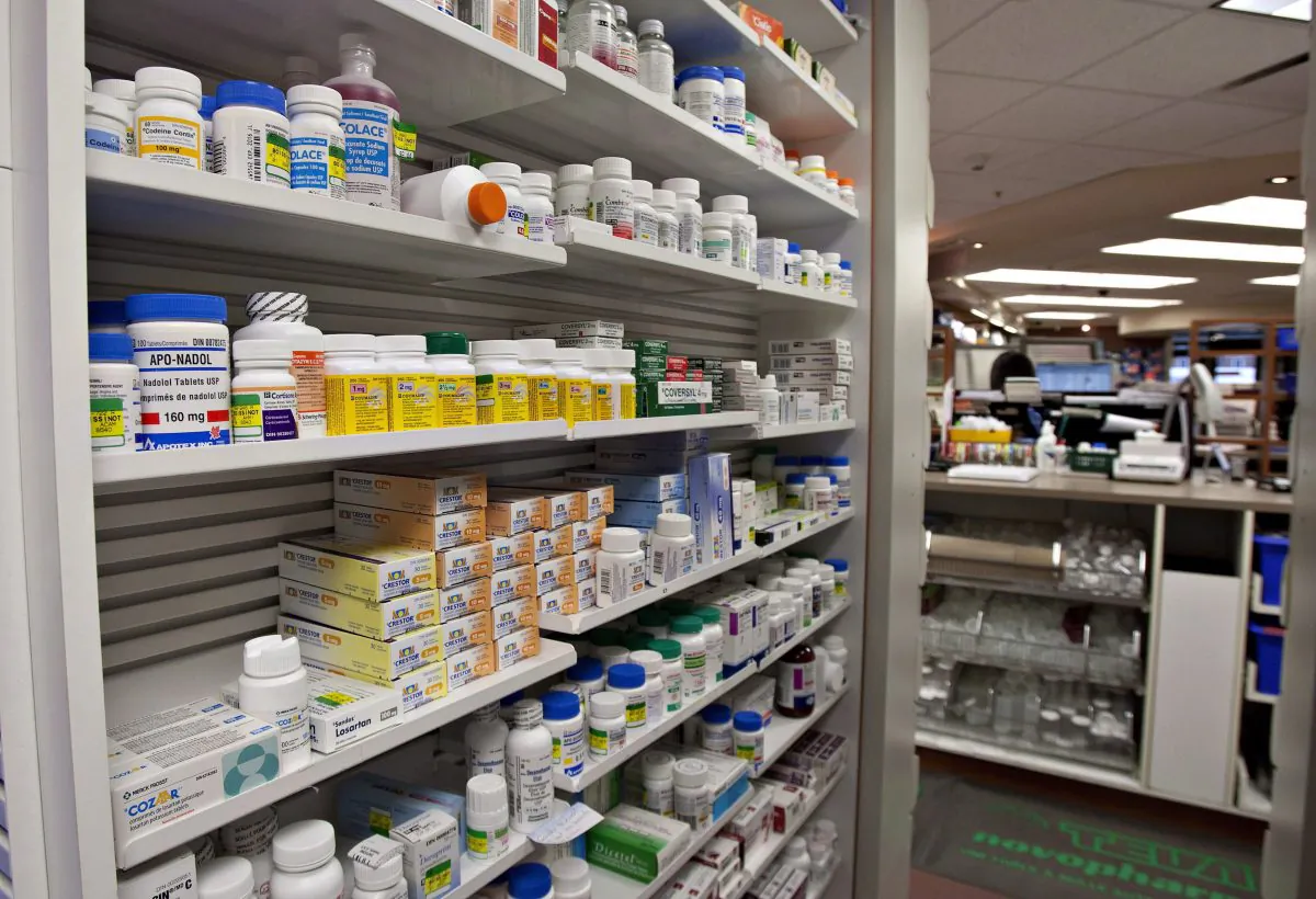 A shelf of drugs at a pharmacy in Quebec City. (Jacques Boissinot/The Canadian Press-File)