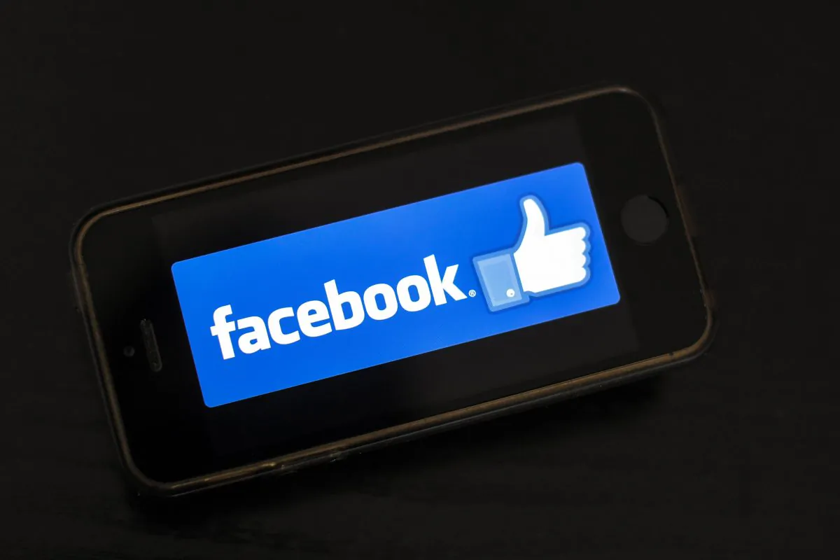 The logo of social network Facebook is displayed on a smartphone in France on January 15, 2019. (LOIC VENANCE/AFP/Getty Images)