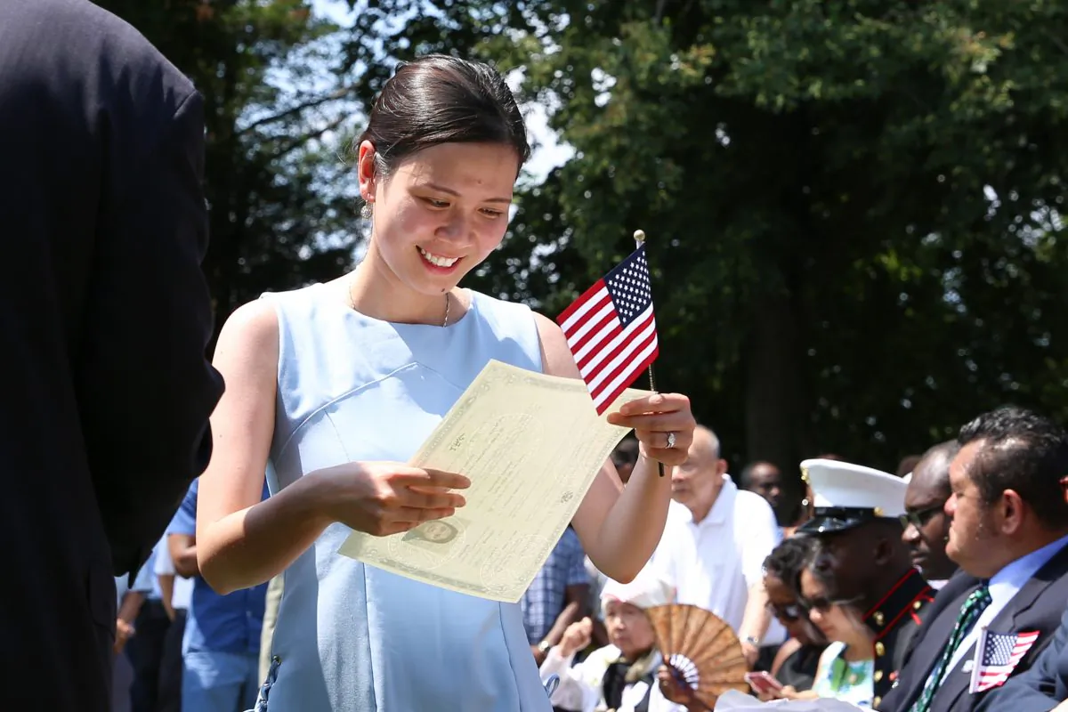 Thao Tran from Vietnam at a naturalization ceremony for America’s 100 newest citizens near the Mansion takes place during Independence day events at President George Washington’s historic home in Mount Vernon, Va., on July 4, 2018. (Samira Bouaou/The Epoch Times)