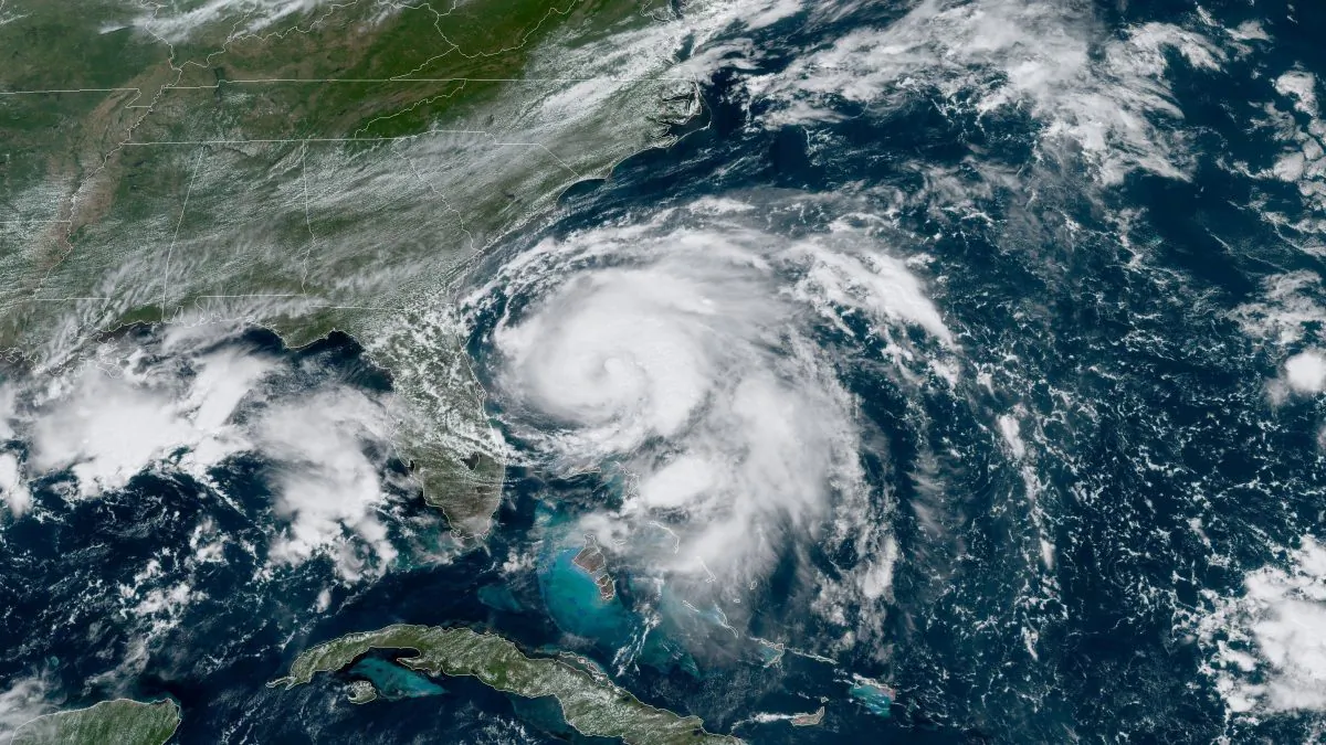 Humberto has been upgraded to a hurricane as it moves farther east into the Atlantic Ocean and away from land. (NOAA)