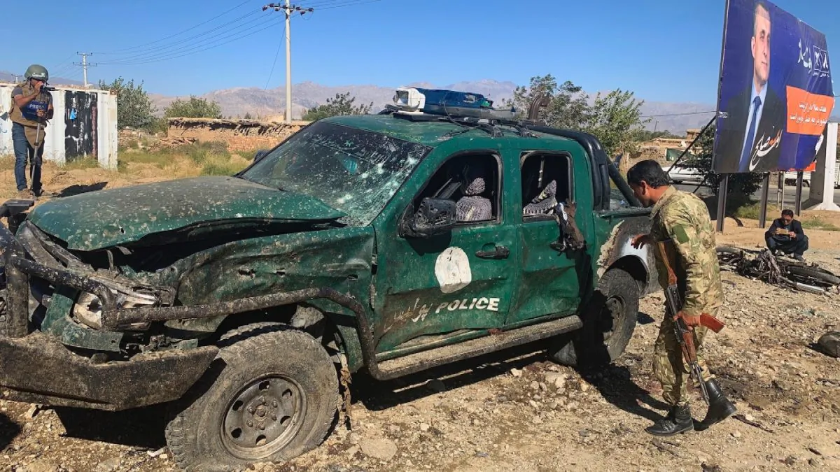 Afghan police inspect the site of a suicide attack, in Parwan province of Afghanistan on Sept. 17, 2019. (Rahmat Gul/AP Photo)
