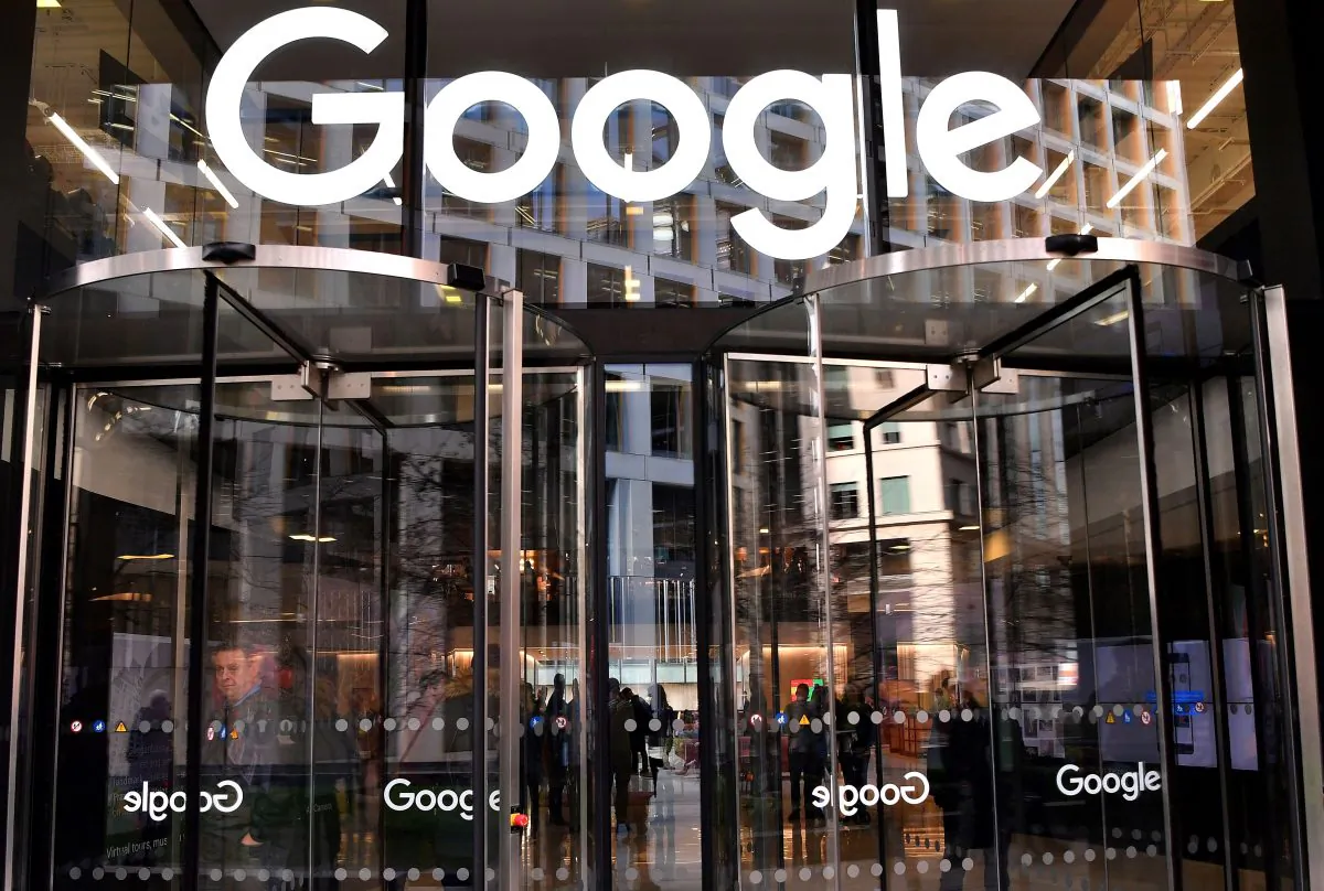 A logo is pictured above the entrance to the offices of Google in London on Jan. 18, 2019. (Ben Stansall/AFP/Getty Images)