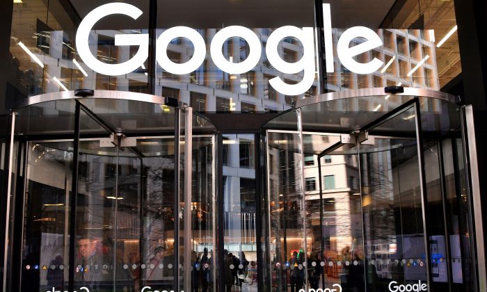 A logo is pictured above the entrance to the offices of Google in London on Jan. 18, 2019. (Ben Stansall/AFP/Getty Images)