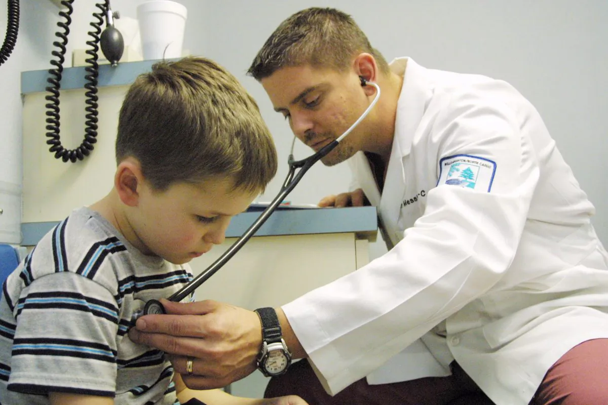 A young boy is examined by a physician's assistant in Vivian, La., in this file photo. (Mario Villafuerte/Getty Images)