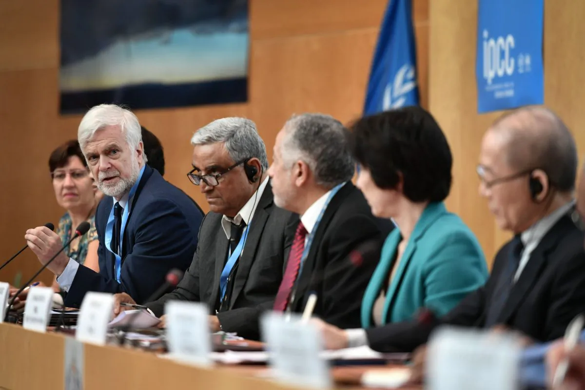 Intergovernmental Panel on Climate Change (IPCC) working group co-chair Jim Skea (2nd L) answers a question during a press conference in Geneva on Aug. 8, 2019. (Fabrice Coffrini/AFP/Getty Images)