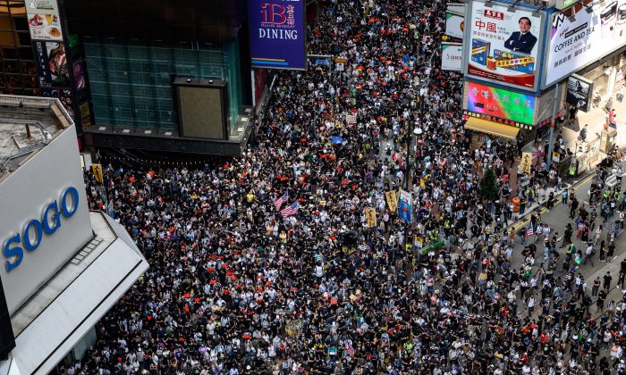 Protesters attend a pro-democracy march in the Causeway Bay district of Hong Kong on Sept. 15, 2019. (Philip Fong/AFP/Getty Images)
