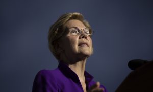 Warren Outlines Plan on 'Restoring Trust' in Judicial System