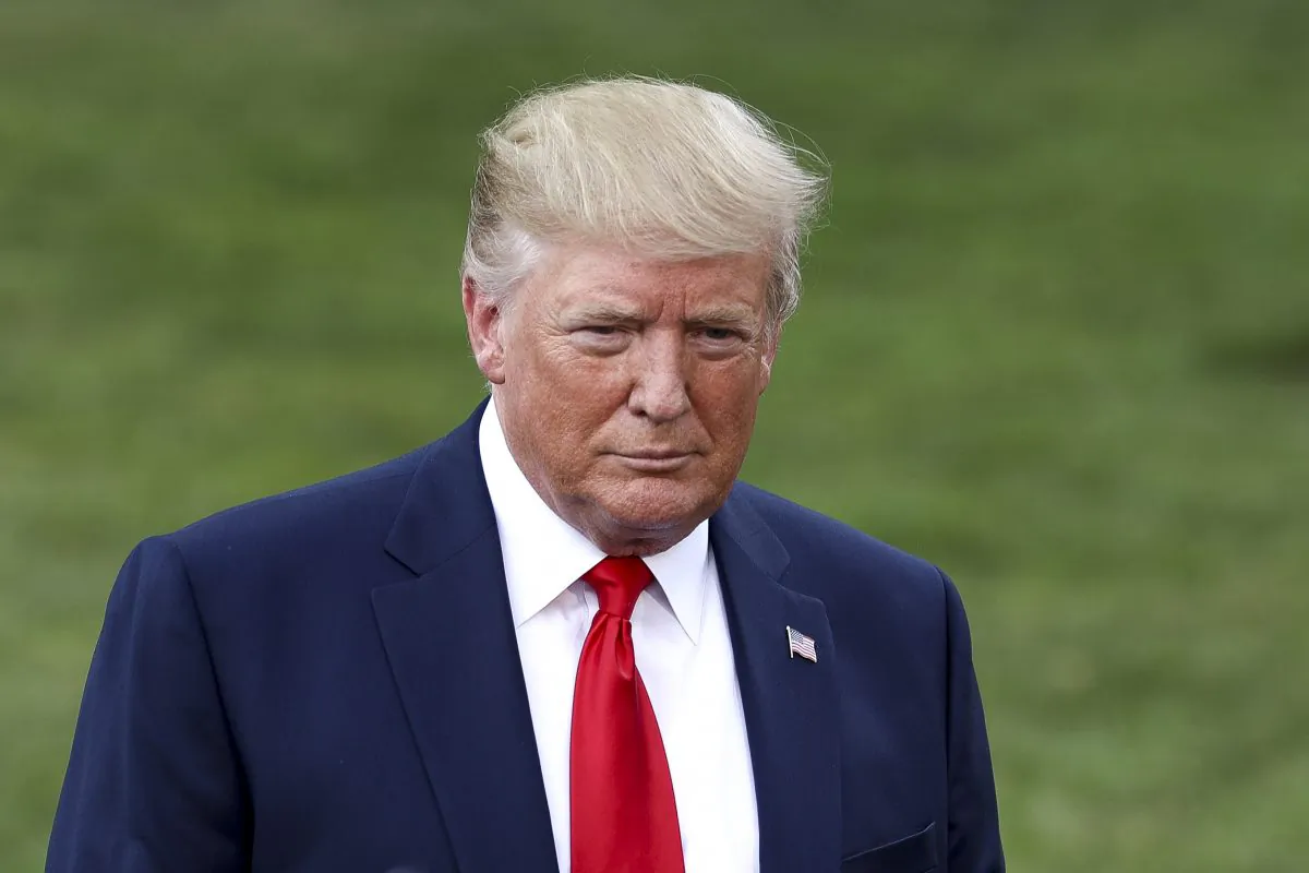 President Donald Trump speaks to the media before boarding Marine One en route to Ohio on the White House South Lawn in Washington on Aug. 1, 2019. (Charlotte Cuthbertson/The Epoch Times)