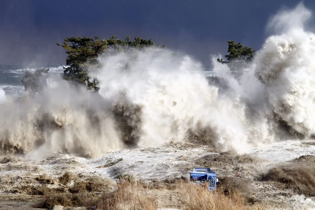 Tsunami waves hitting the coast of Minamisoma in Fukushima prefecture, Japan, on March 11, 2011. (Sadatsugu Tomizawa/AFP/Getty Images)