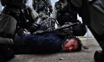 Amnesty International Accuses Hong Kong Police of ‘Brutal Beatings,’ Torture