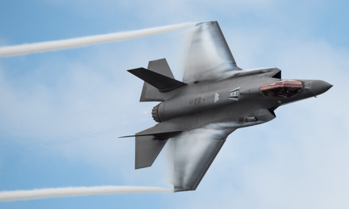 Capt. Andrew Olson, F-35 Demonstration Team pilot and commander, performs a dedication pass during the Melbourne Air and Space Show in Melbourne, Fla., on March 30, 2019. During the two-day event, more than 50,000 guests attended the Melbourne Air and Space Show. (U.S. Air Force photo by Senior Airman Alexander Cook)