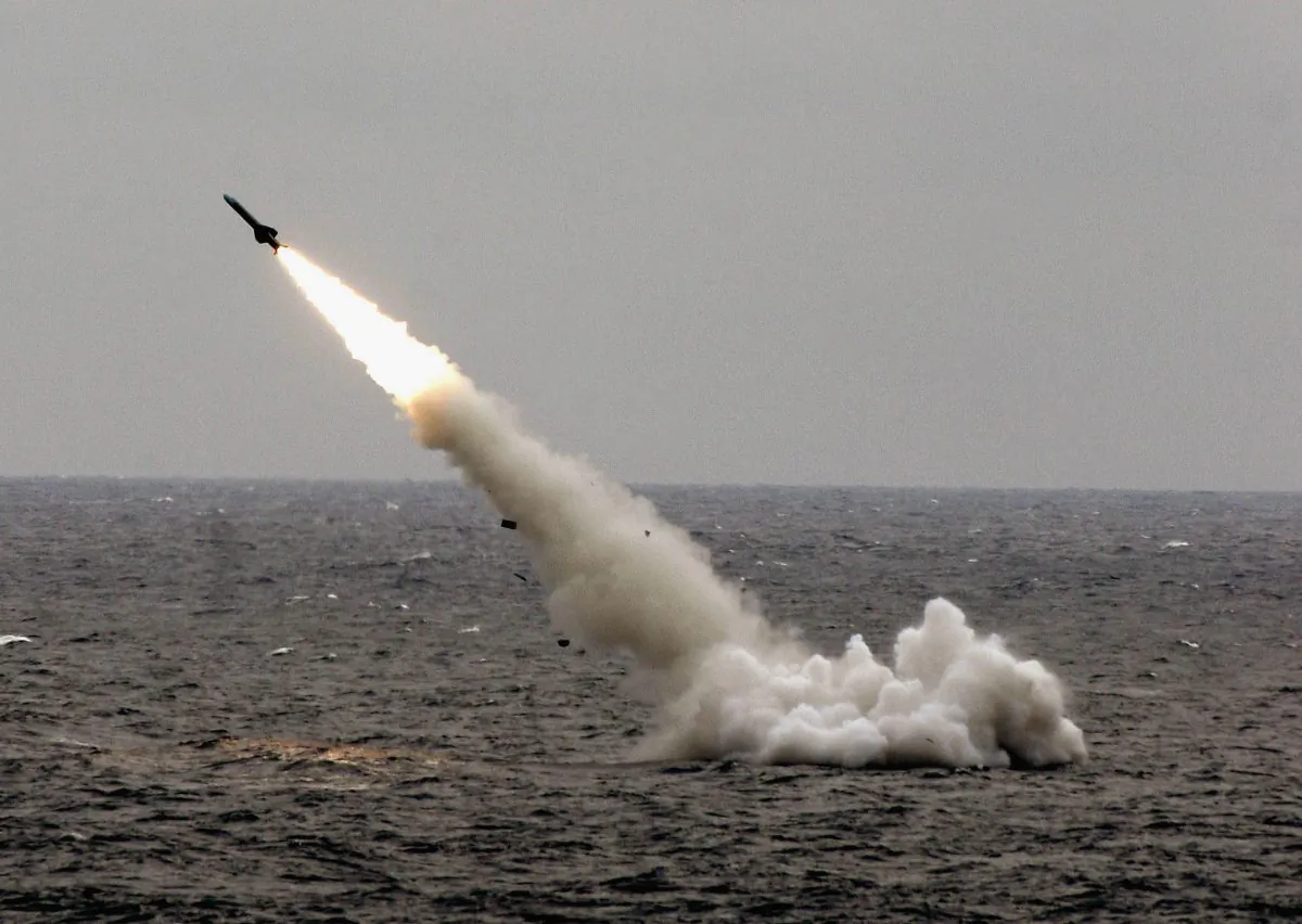 A Chinese submarine launches a missile in an offshore blockade exercise during the third phase of the Sino-Russian "Peace Mission 2005" joint military exercise, held Aug. 23, 2005 near China's Shandong Peninsula. (China Photos/Getty Images)