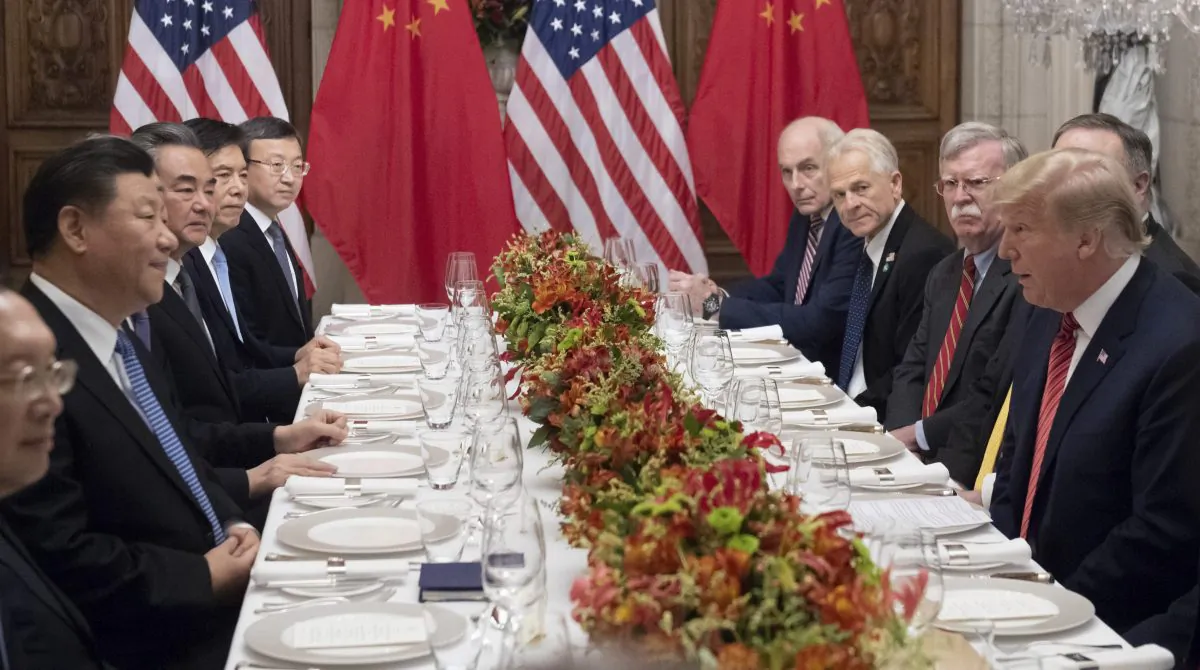 U.S. President Donald Trump (R) and China's President Xi Jinping (L) along with members of their delegations, hold a dinner meeting at the end of the G20 Leaders' Summit in Buenos Aires, on December 01, 2018. - US President Donald Trump and his Chinese counterpart Xi Jinping had the future of their trade dispute -- and broader rivalry between the world's two top economies -- on the menu at a high-stakes dinner Saturday. (Saul Loeb/AFP/Getty Images)