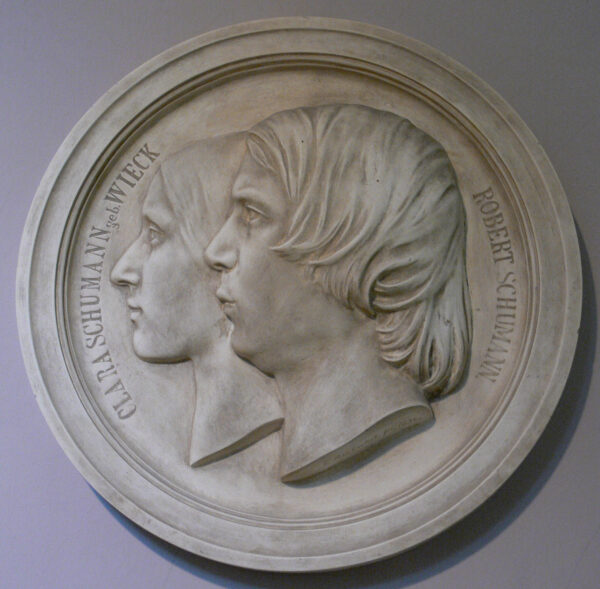 Portrait medallion of man and wife