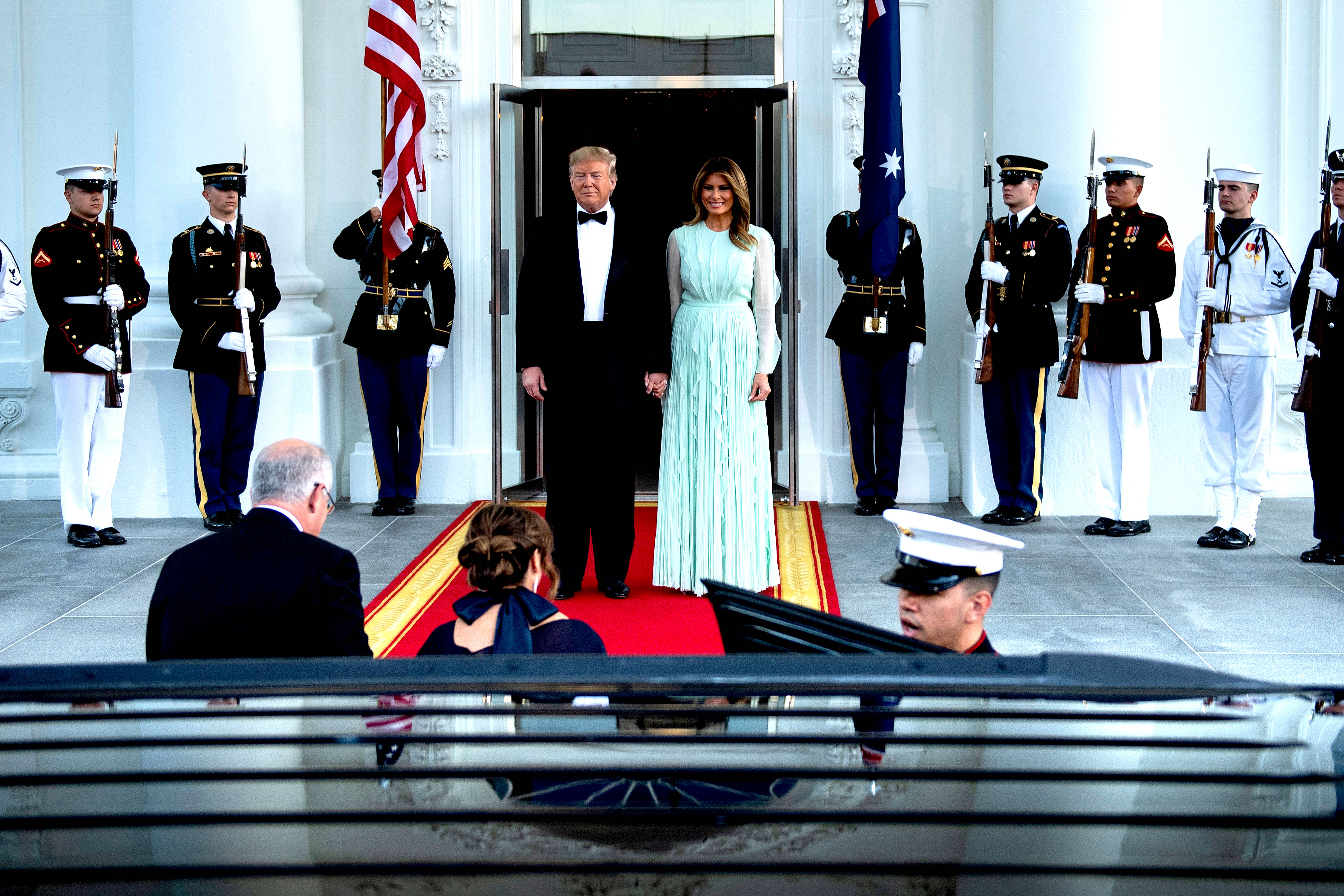 Trump and Melania welcome Morrison