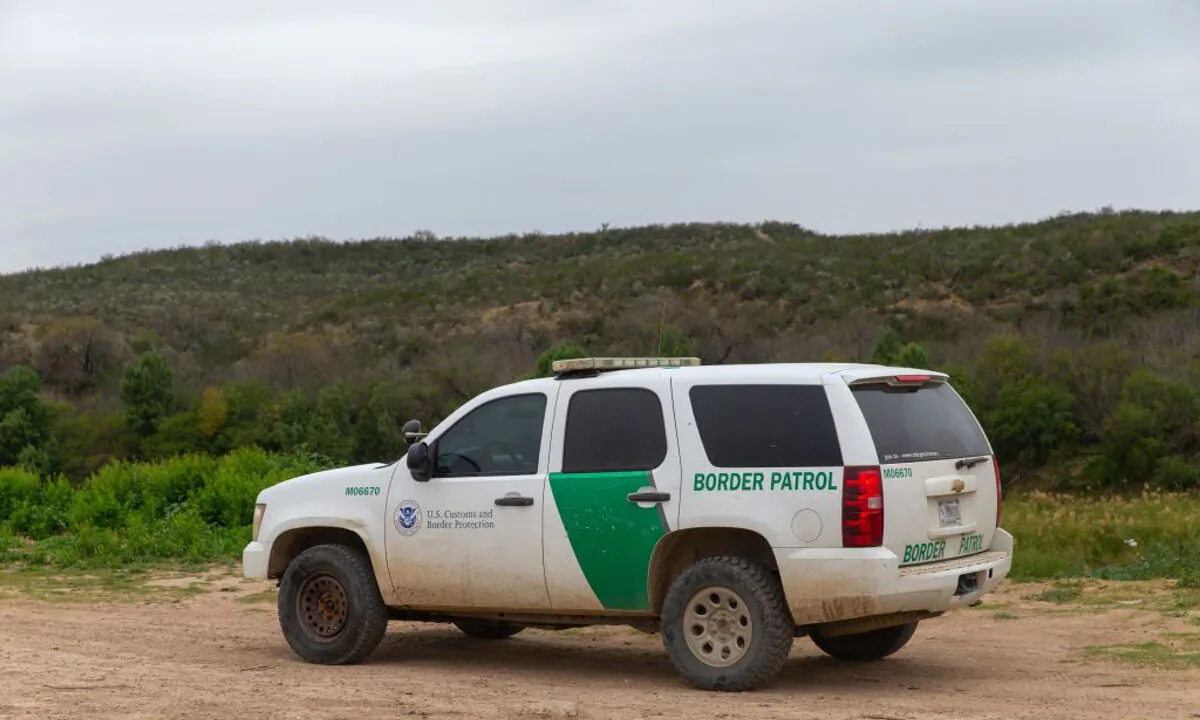 A United States Border Patrol car drives near the Rio Grande in Laredo, Texas, on Jan. 14, 2019. (Suzanne Cordeiro/AFP/Getty Images)