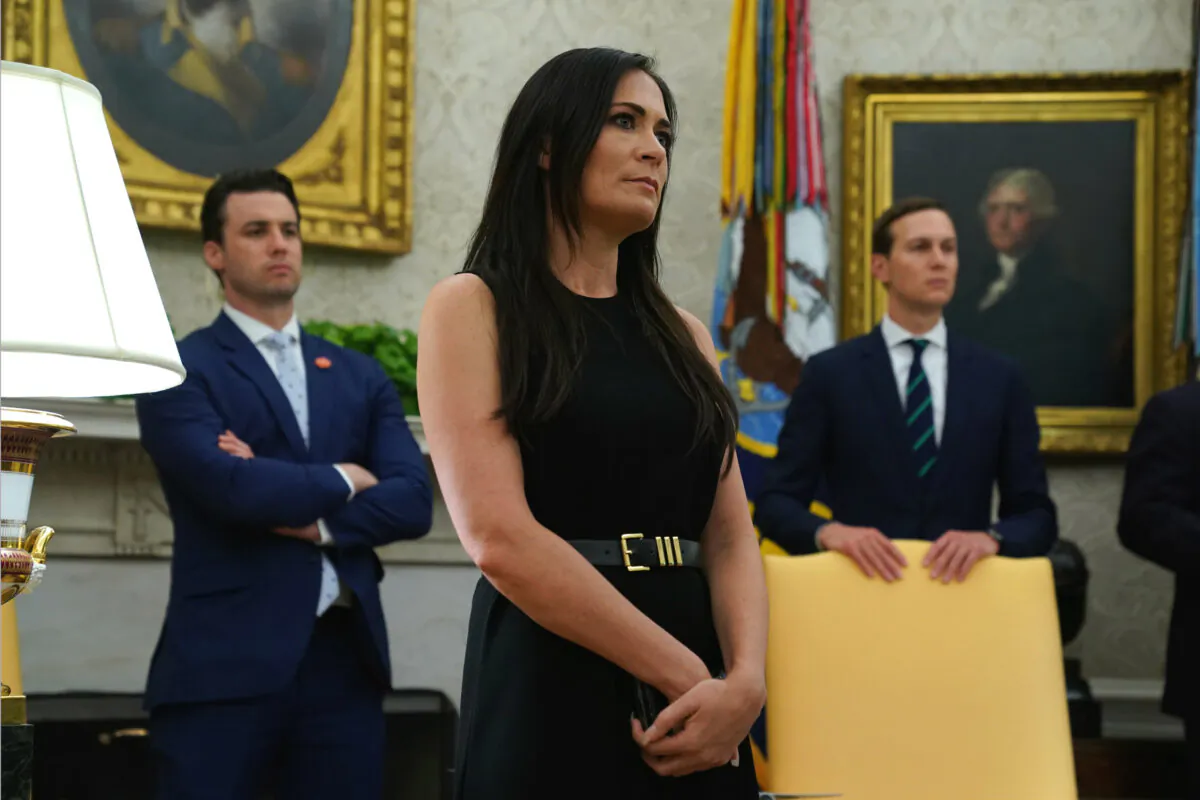 White House Press Secretary Stephanie Grisham listens during a signing of a “safe third country” agreement in the Oval Office of the White House in Washington on July 26, 2019. (Alex Wong/Getty Images)