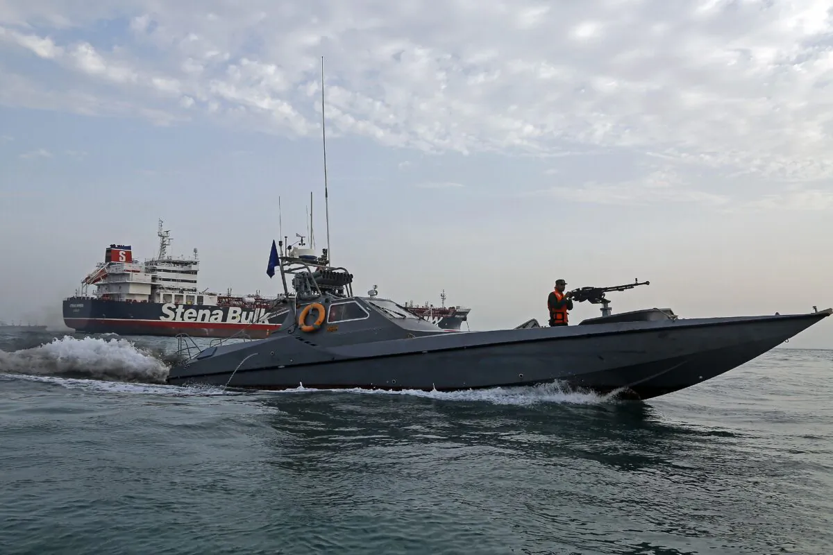 Iranian Revolutionary Guards patrol around the British-flagged tanker Stena Impero off the Iranian port city of Bandar Abbas, in this file photo. (Hasan Shirvani/AFP/Getty Images)