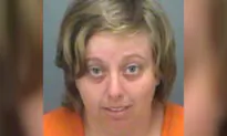 Woman Arrested After Video Showed Her Kicking, Choking Dog