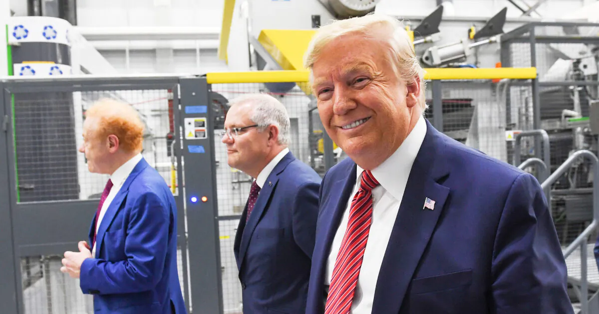 President Donald Trump (R), Global Chairman of Pratt/Visy Industries Anthony Pratt (L) and Australian Prime Minister Scott Morrison visit Pratt Industries during the plant's opening in Wapakoneta, Ohio on Sept. 22, 2019. (Saul Loeb/AFP/Getty Images)