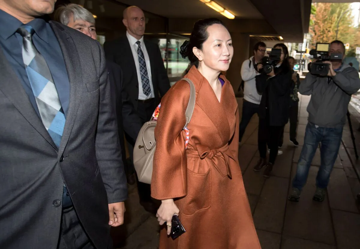 Huawei chief financial officer Meng Wanzhou, who is out on bail and remains under partial house arrest after she was detained last year at the behest of American authorities, leaves the B.C. Supreme Court in Vancouver during lunch break from a hearing on Sept. 23, 2019. (THE CANADIAN PRESS/Darryl Dyck)