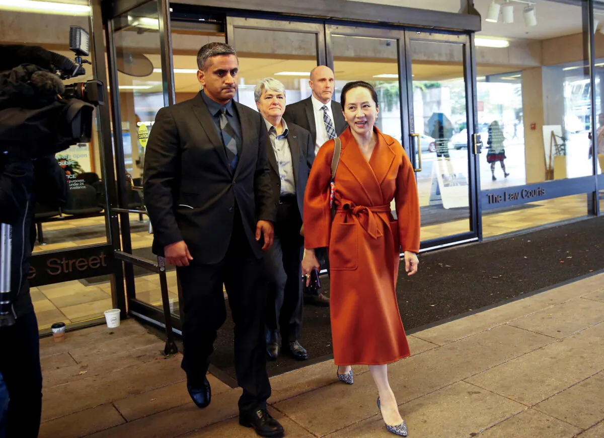 Huawei Technologies Chief Financial Officer Meng Wanzhou leaves for a lunch break during a hearing at British Columbia supreme court, in Vancouver, British Columbia, Canada on Sept. 23, 2019. (Lindsey Wasson/Reuters)