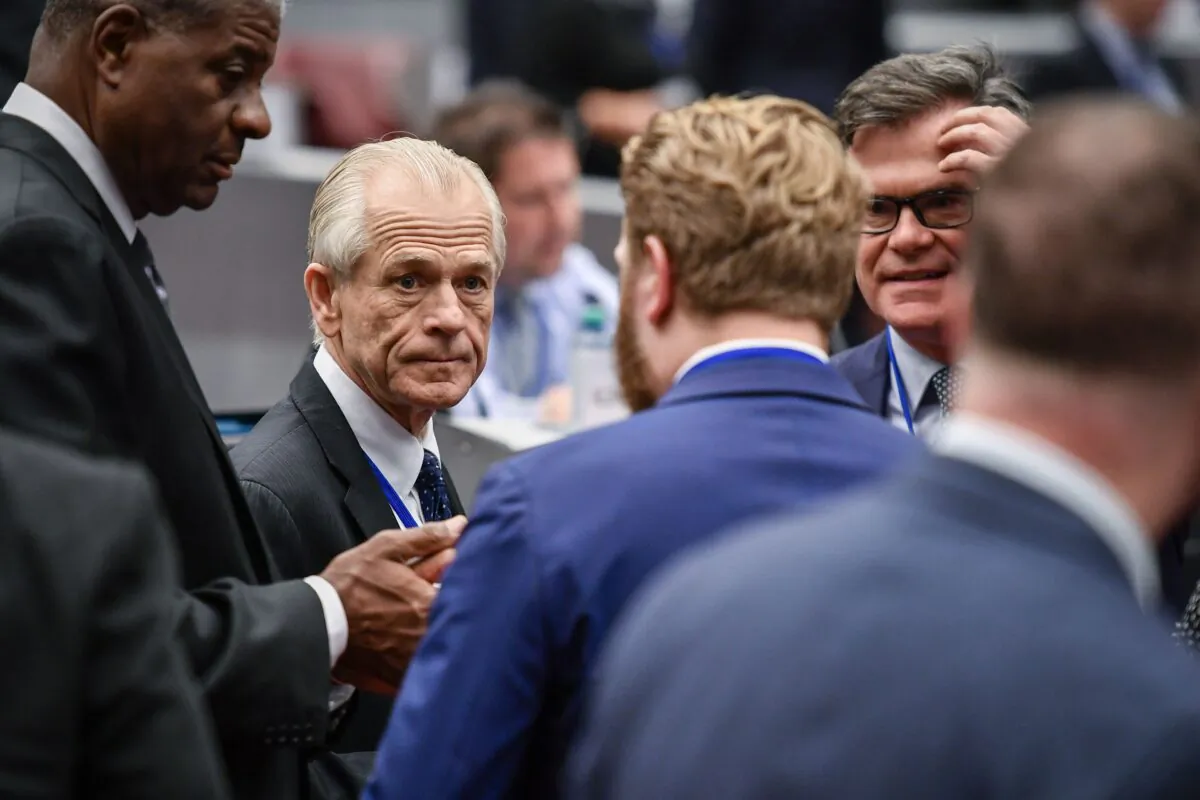 White House trade advisor Peter Navarro (L) looks on during a break during an extraordinary congress of the Universal Postal Union (UPU) with the US threatening to quit the global body as early as next month, in Geneva on Sept. 24, 2019. (Fabrice Coffrini/AFP/Getty Images)