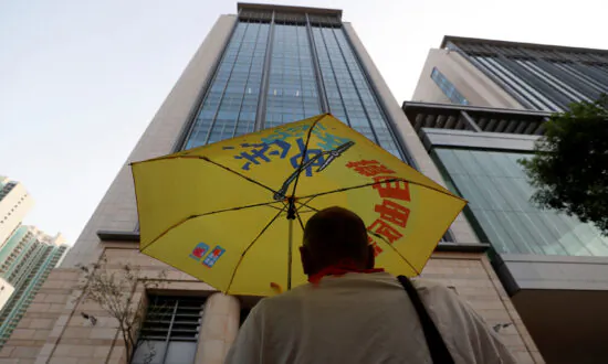 Dozens of Hong Kong Protesters Appear in Court on Rioting Charges