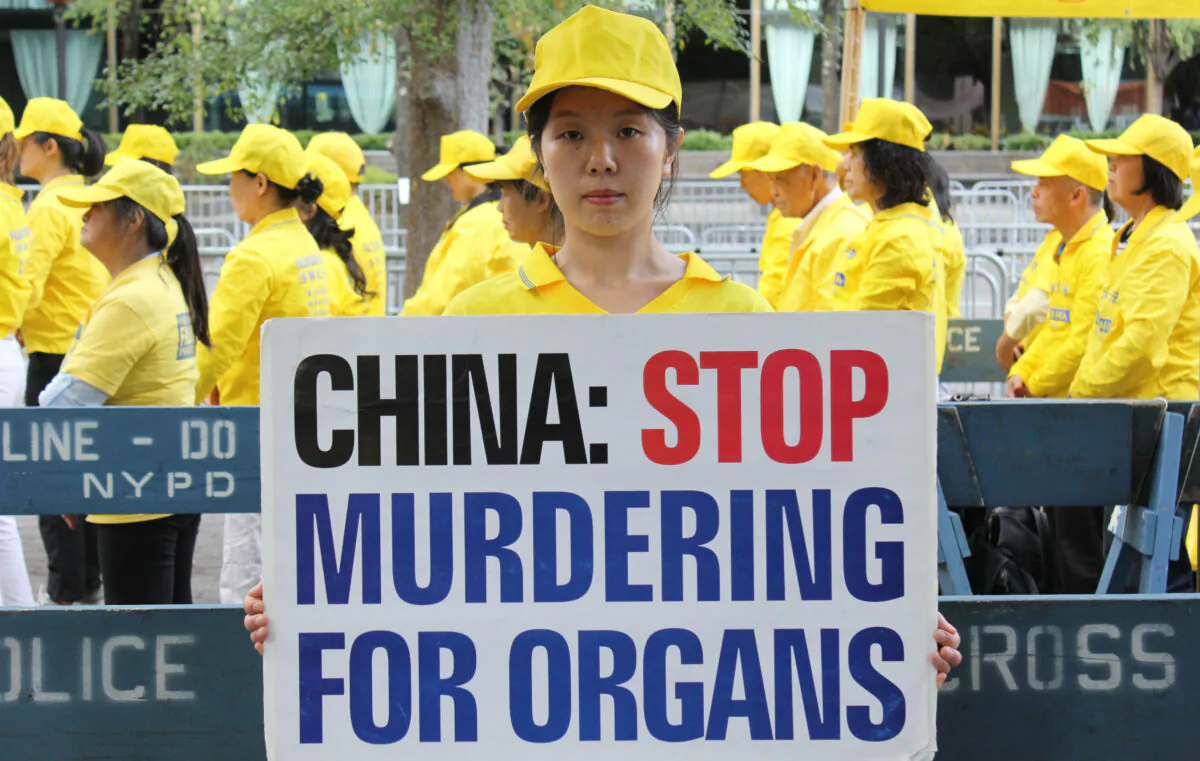 Han Yu, whose father was killed in China because of his belief in Falun Gong, at a rally at the United Nations Plaza in New York City, on Sept. 24, 2019. (Eva Fu/The Epoch Times)
