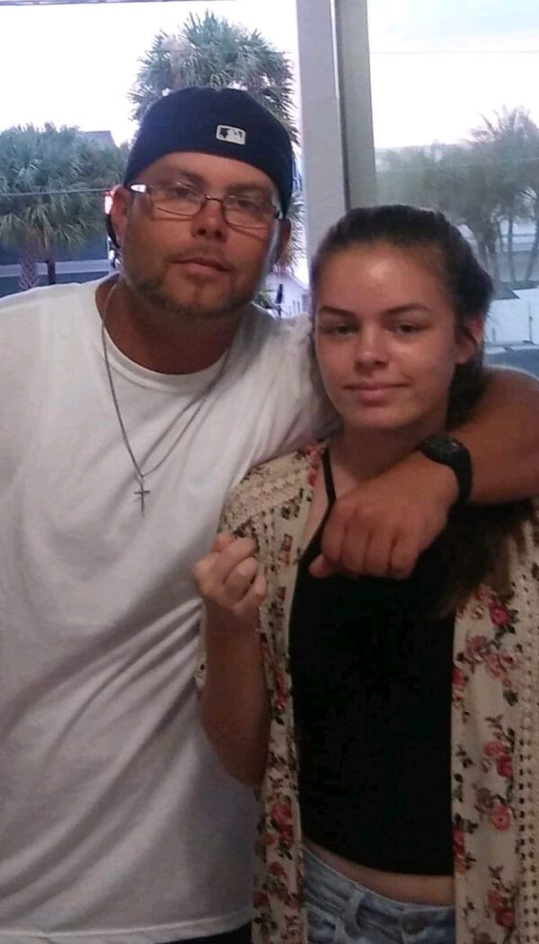 Phillips with his daughter