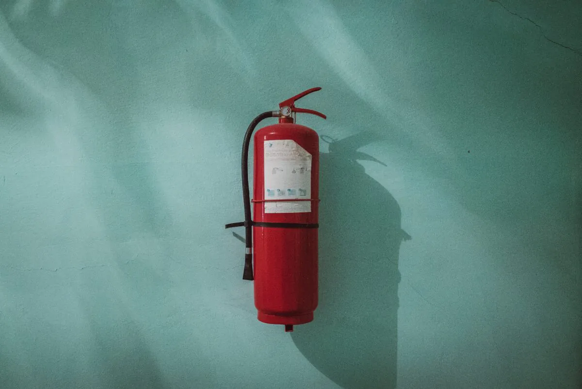 Stock photo of a fire extinguisher. (Piotr Chrobot/Unsplash)