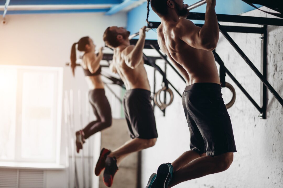 Pull-ups offer a whole-body workout without a gym, trainer, or expensive equipment. (UfaBizPhoto/Shutterstock)