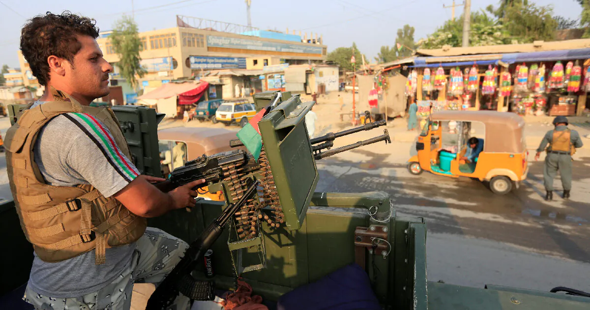 An Afghan policeman stands guard at a checkpoint in Jalalabad, Afghanistan, on Sept. 26, 2019. (Parwiz/Reuters)