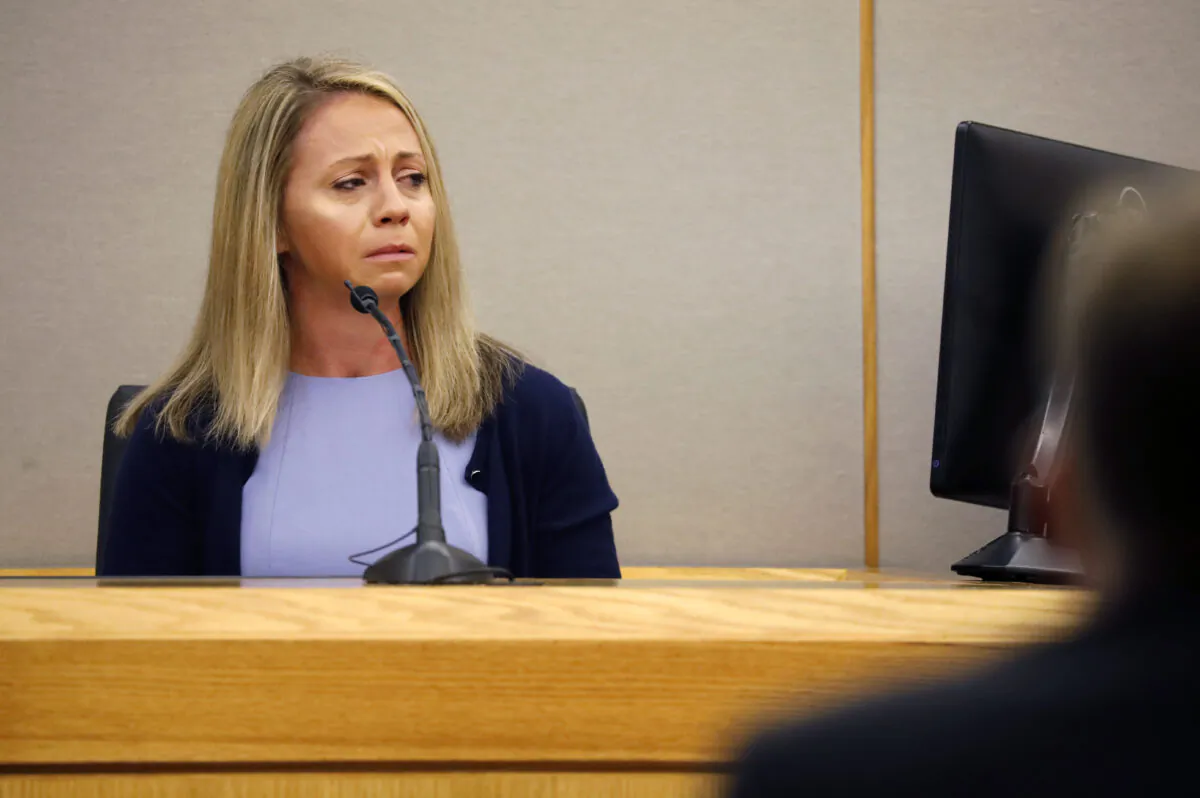 Fired Dallas police officer Amber Guyger becomes emotional as she testifies in her murder trial, in Dallas on Sept. 27, 2019. (Tom Fox/The Dallas Morning News via AP, Pool)