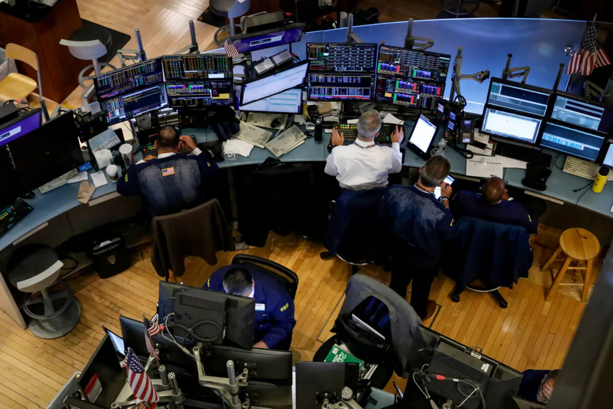 Traders work on the floor at the New York Stock Exchange (NYSE) in New York, U.S. on Sept. 9, 2019. (Brendan McDermid/Reuters)