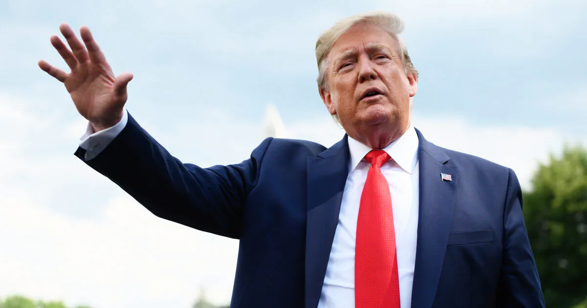 U.S. President Donald Trump gestures as he speaks to members of the press prior to departing from the South Lawn of the White House in Washington, DC, July 24, 2019. (Roberto Schmidt/AFP/Getty Images)
