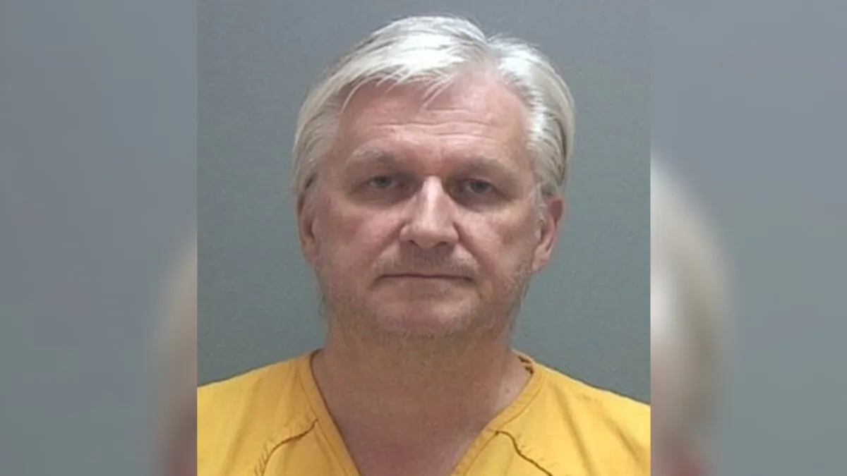 Ron Rockwell Hansen, a former U.S. intelligence officer who pleaded guilty to trying to sell secrets to China. (Salt Lake County Sheriff's Office via AP)