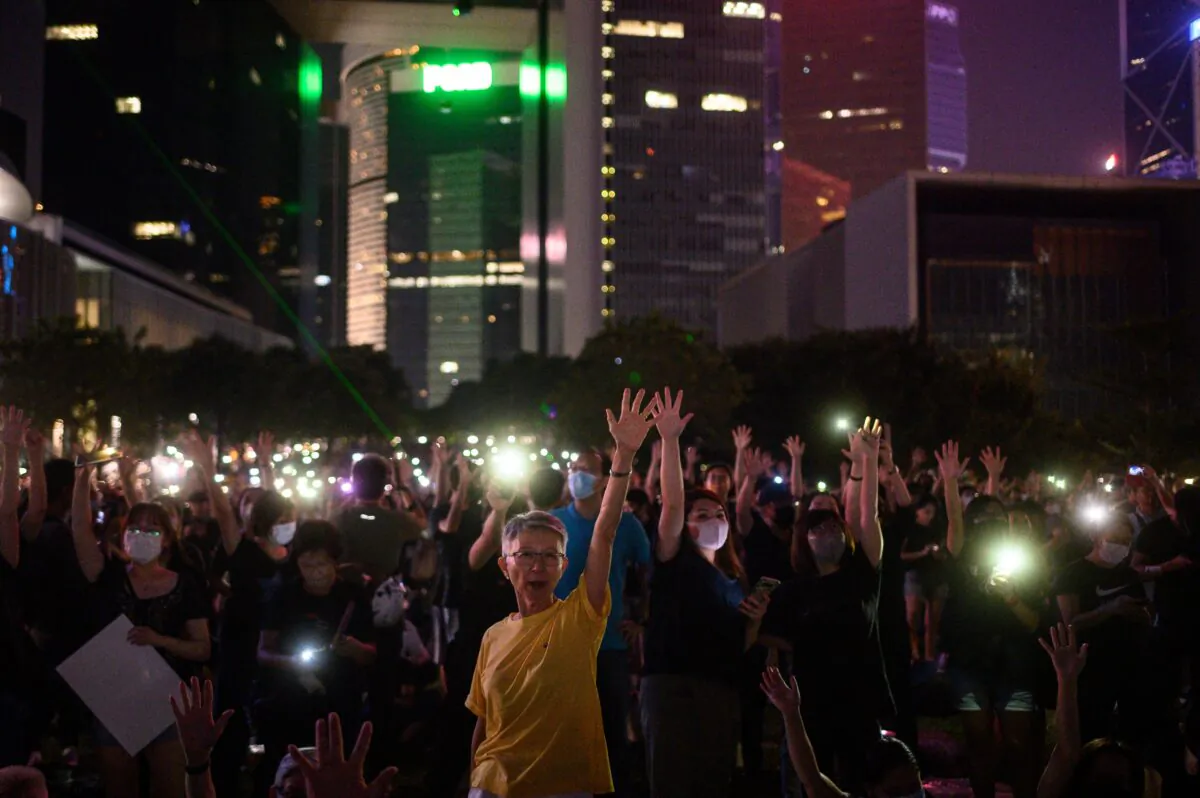 People attend a rally to mark the fifth anniversary of the "Umbrella Movement," in the Admiralty area of Hong Kong on Sept. 28, 2019. (Philip Fong/AFP/Getty Images)