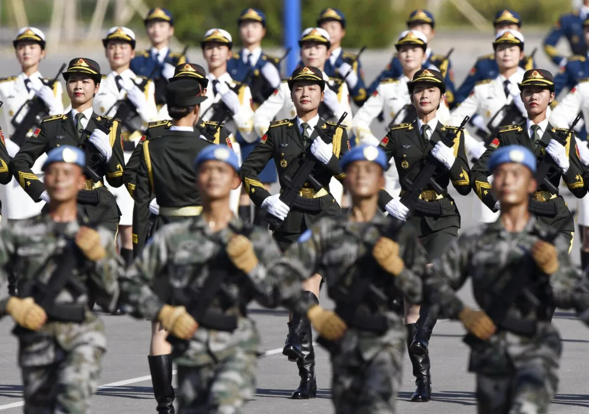 Chinese soldiers practice in Beijing on Sept. 25, 2019, ahead of a military parade on Oct. 1 to mark the 70th anniversary of the founding of the People's Republic of China (Kyodo)