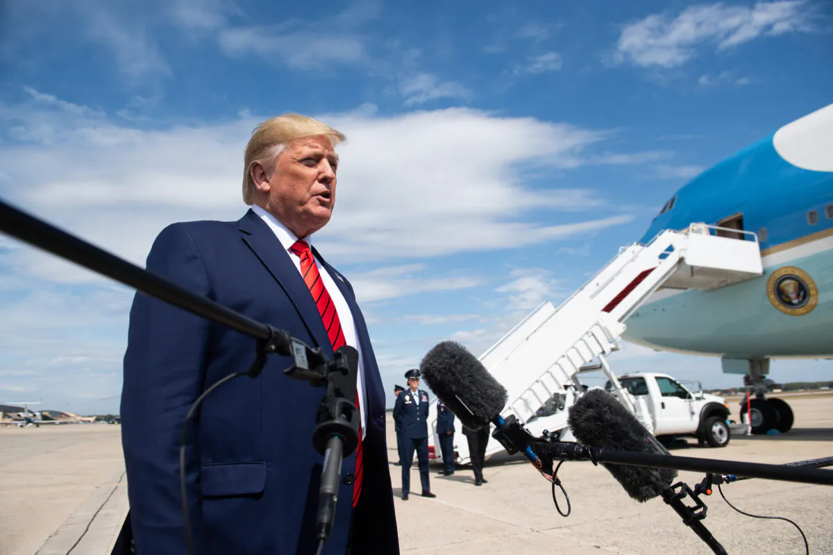 President Donald Trump speaks to the press after arriving on Air Force One at Joint Base Andrews in Maryland, on Sept. 26, 2019, after returning from New York City. (Saul Loeb/AFP/Getty Images)