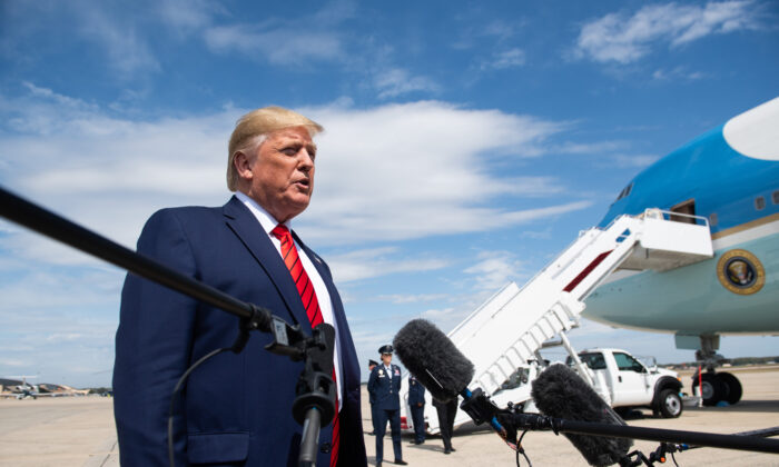 President Donald Trump speaks to the press after arriving on Air Force One at Joint Base Andrews in Maryland, on Sept. 26, 2019. (Saul Loeb/AFP/Getty Images)